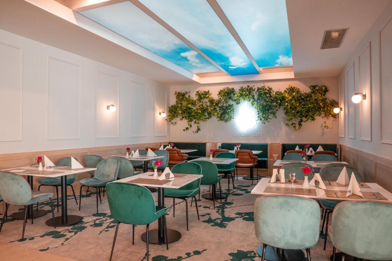 Garden City Hotel Конич Екстериор снимка